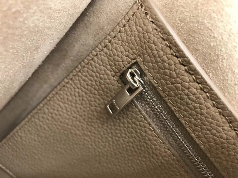 Side profile of modern premium women's handbag – women's statement bag