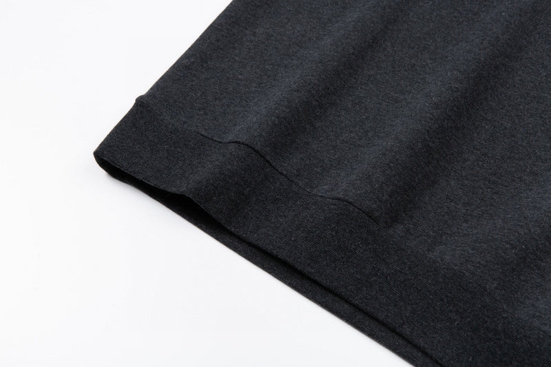 Close-up detail shot of Louis Vuitton luxury clothing with signature branding