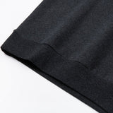 Close-up detail shot of Louis Vuitton luxury clothing with signature branding