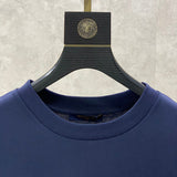 Full styled look of Louis Vuitton cotton t-shirt with everyday silhouette