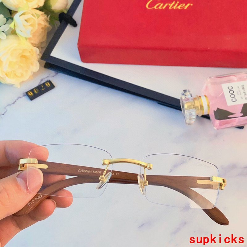 Angled view of Cartier unisex sunglasses