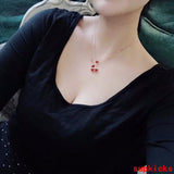 Angled view of Van Cleef & Arpels unisex jewelry piece