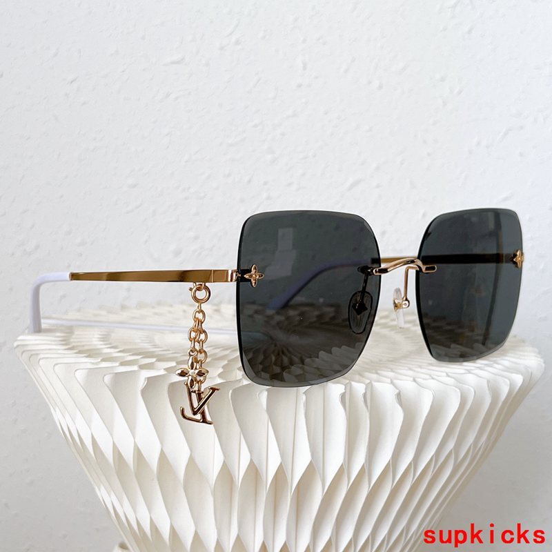 Close-up detail view of Louis Vuitton unisex sunglasses