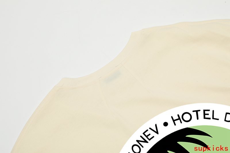Back view of Rhude luxury clothing with signature branding