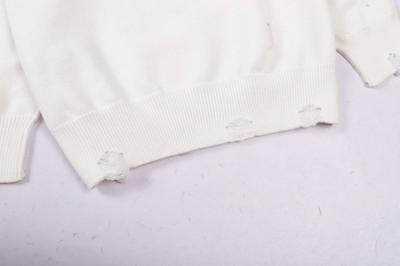 Side profile of Louis Vuitton luxury clothing with label-forward styling