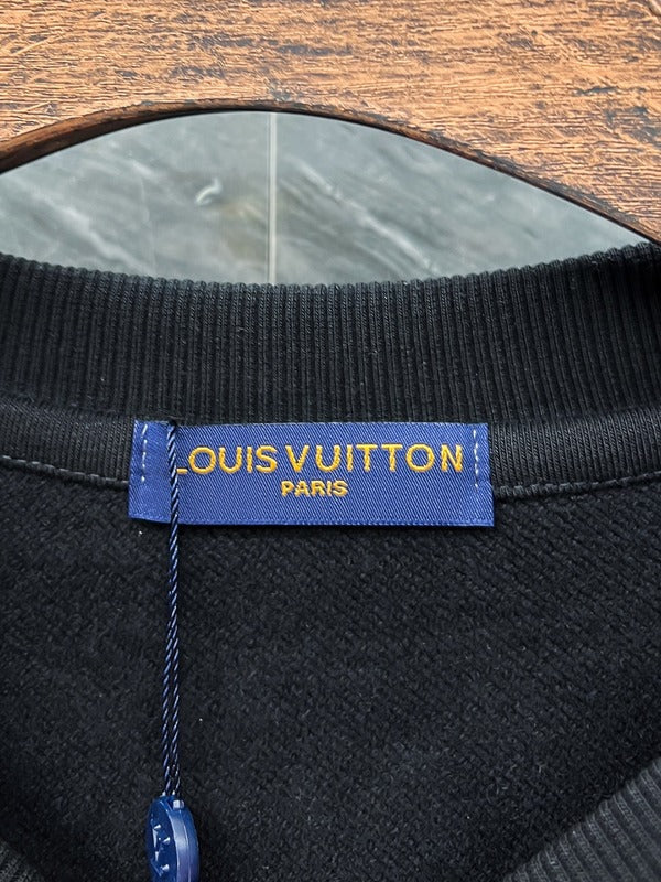 Side profile of Louis Vuitton luxury clothing with tailored silhouette