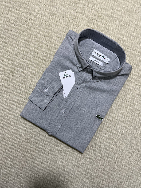 Side profile of Lacoste luxury clothing with logo-detail design