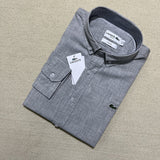 Side profile of Lacoste luxury clothing with logo-detail design