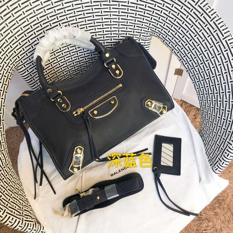 Front view of polished elevated women's handbag – women's luxury accessory