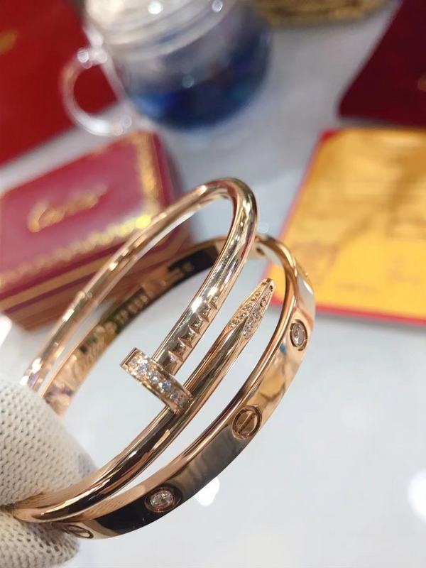 Close-up detail view of Cartier unisex jewelry piece