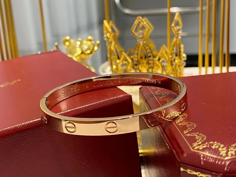 Angled view of Cartier unisex jewelry piece