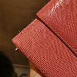 Side view of contemporary structured handbag