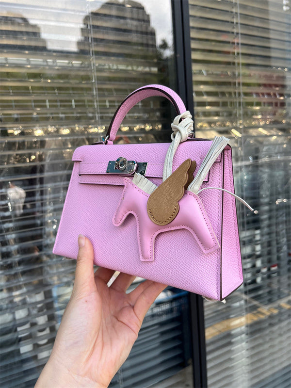 Side view of poised structured handbag