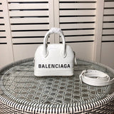 Zivas Charm Elevated Essentials Statement Handbag (Elevated Accessory Essential) – Angled View