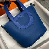 Side view of clean-lined structured handbag