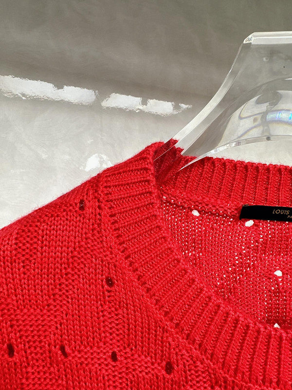 Close-up detail shot of Louis Vuitton luxury clothing with runway-inspired design