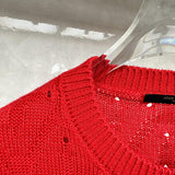 Close-up detail shot of Louis Vuitton luxury clothing with runway-inspired design