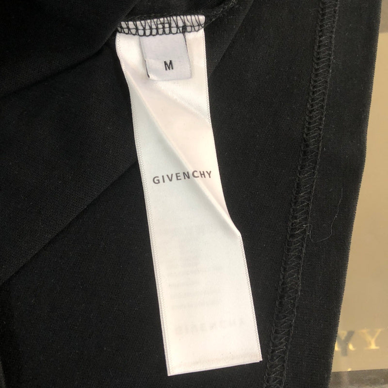 Side profile of Givenchy luxury clothing with tailored silhouette
