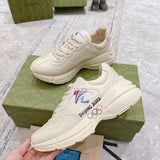Gucci classic monochrome luxury sneakers view 5 retro runner design