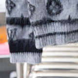Front view of Louis Vuitton luxury clothing with tailored silhouette