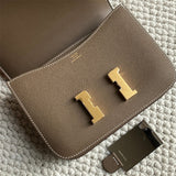 Side view of poised structured handbag