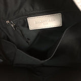 Side profile of signature everyday-luxe women's handbag – women's statement bag