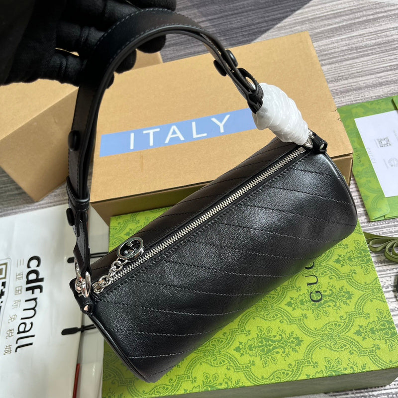 Side profile of structured classic women's handbag – women's luxury accessory