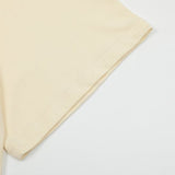 Close-up detail shot of Rhude luxury clothing with relaxed-fit cut