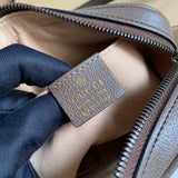Side profile of chic polished women's handbag – women's luxury accessory