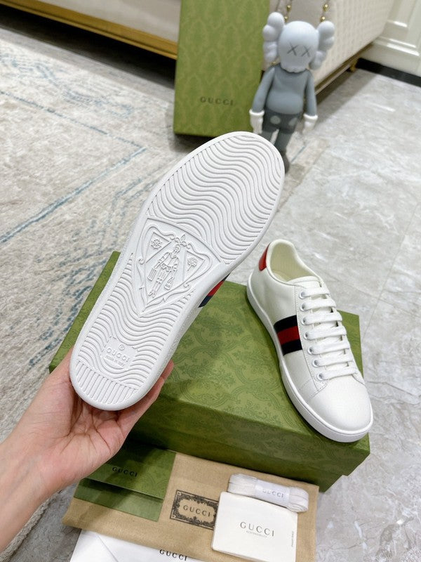 Side profile of Gucci fresh white-and-black sneakers breathable knit upper