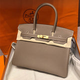  Timeless crossbody bag carried on shoulder