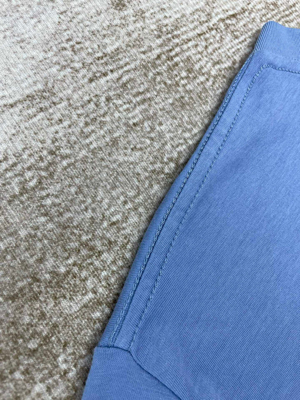 Side profile view of Amiri luxury piece style No.144