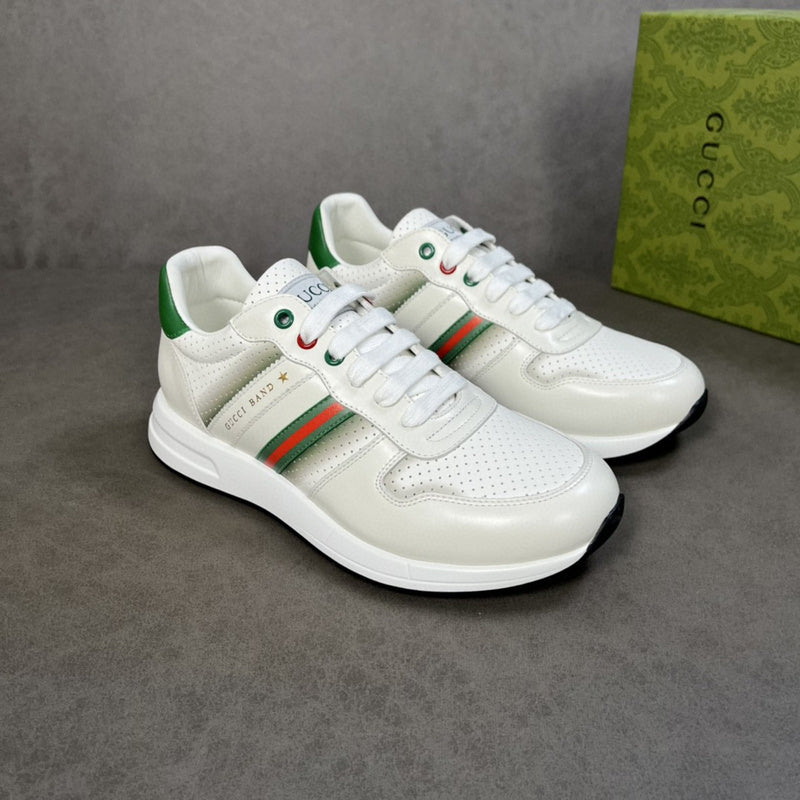 Gucci Designer sneakers in muted earth tones heritage-inspired look front view