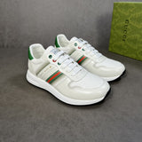 Gucci Designer sneakers in muted earth tones heritage-inspired look front view