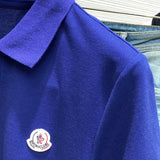 Full styled look of Moncler luxury clothing with signature branding
