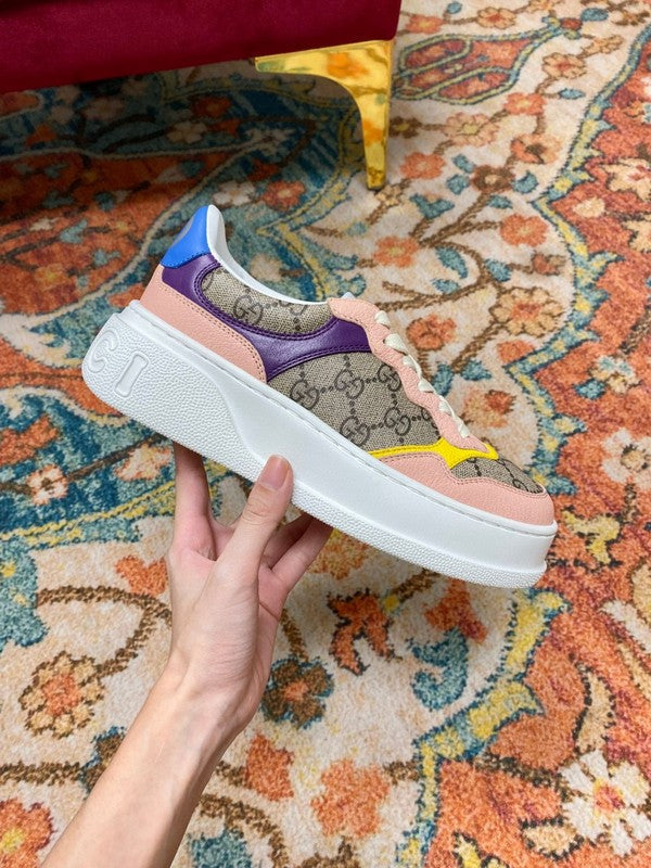 Gucci Designer sneakers in crisp white retro runner design front view