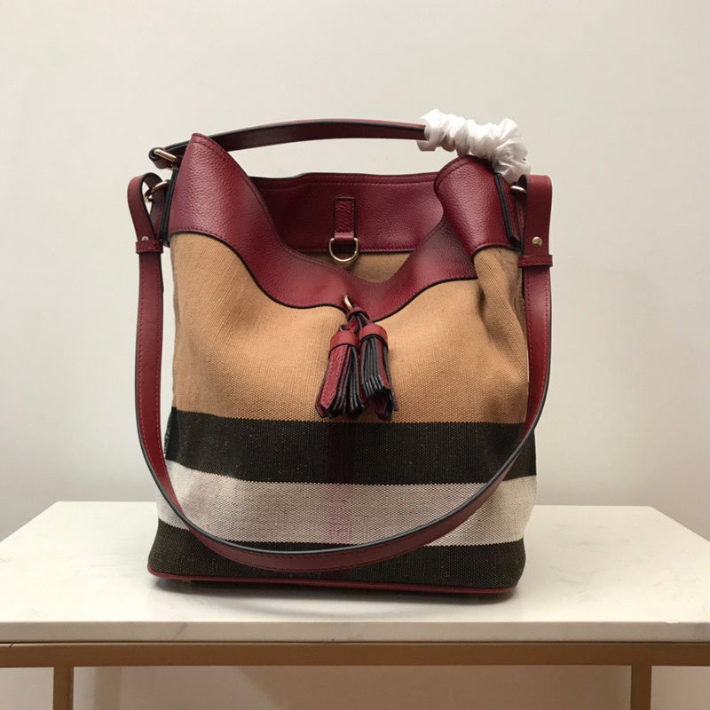 Ziva's Charm handbag – side angle view (one versatile size)