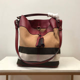 Ziva's Charm handbag – side angle view (one versatile size)