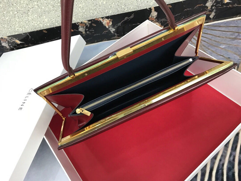 Handle and strap detail of everyday-luxe polished women's handbag – women's luxury handbag