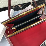 Handle and strap detail of everyday-luxe polished women's handbag – women's luxury handbag