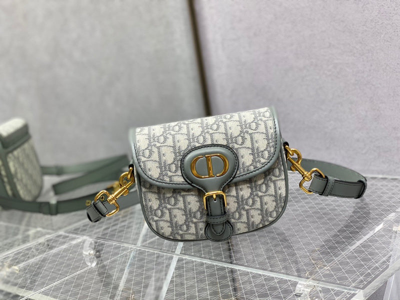 Handle and strap detail of everyday-luxe polished women's handbag – women's designer-style accessory