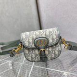 Handle and strap detail of everyday-luxe polished women's handbag – women's designer-style accessory