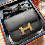 Side view of streamlined structured handbag