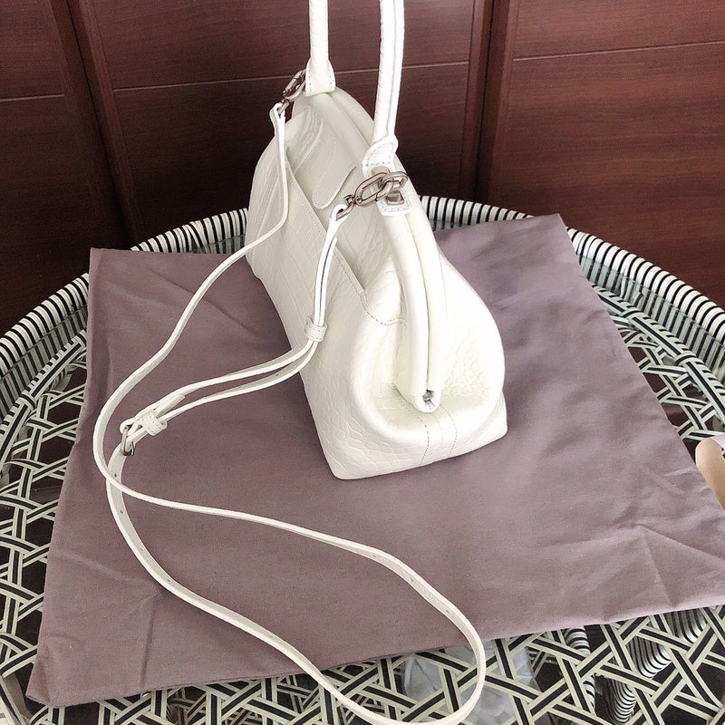 Close-up detail of elevated modern women's handbag – women's statement bag