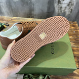 Side profile of Gucci classic monochrome sneakers low-top design