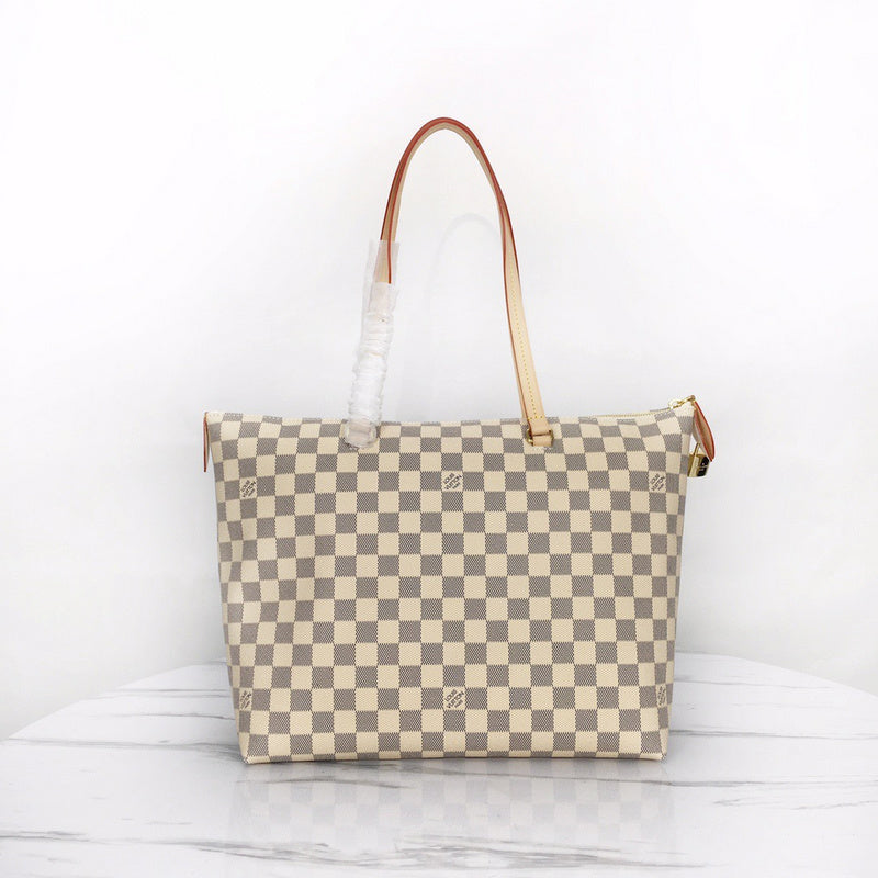 Close-up detail of signature polished women's handbag – women's everyday handbag
