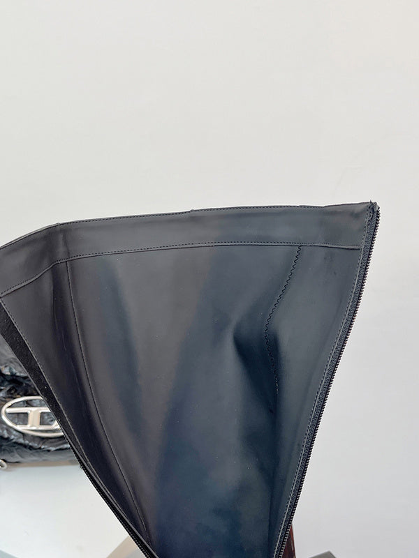Side profile view of Saint Laurent luxury piece style No.050