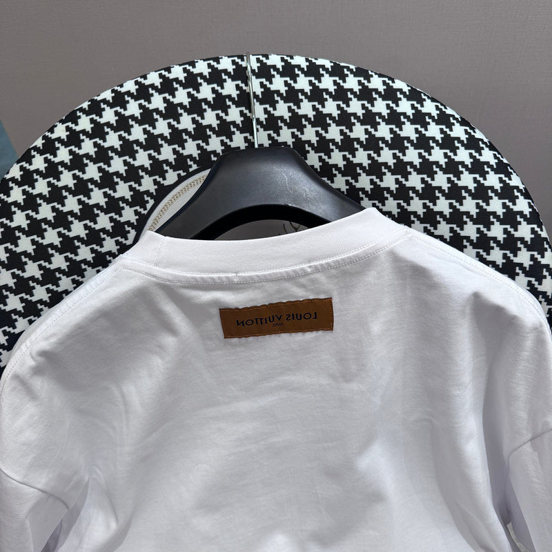 Close-up detail shot of Louis Vuitton cotton t-shirt with monogram-inspired silhouette