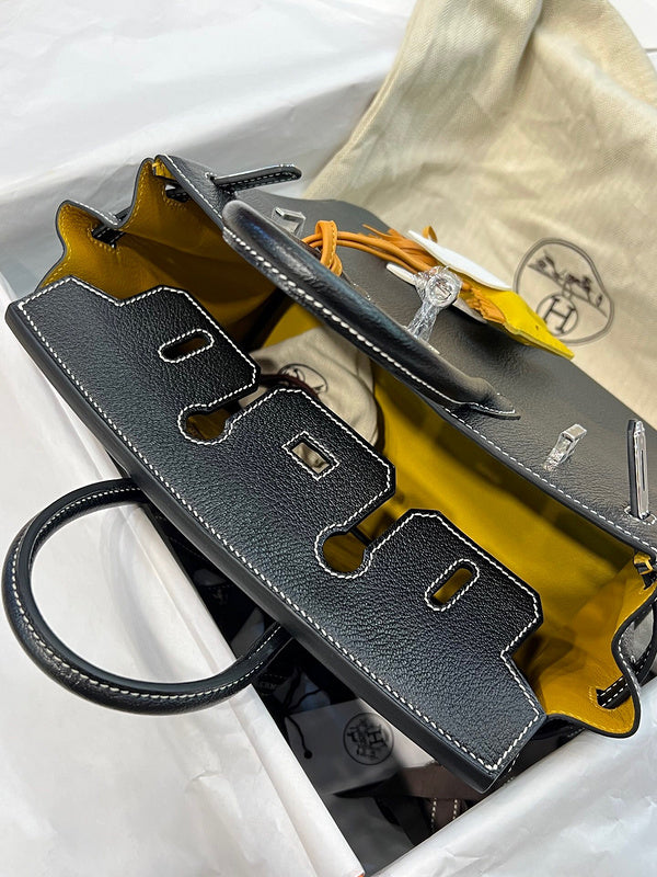 Side view of refined structured handbag