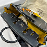 Side view of refined structured handbag